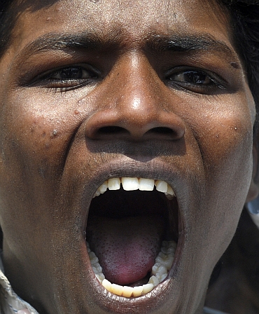 A pro-Telangana supporter shouts slogans during a demonstration in Hyderabad