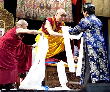 The Dalai Lama greets the faithful at a Kalachakra for World Peace in Washington