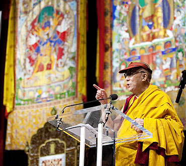 The Dalai Lama greets the faithful at a Kalachakra for World Peace in Washington