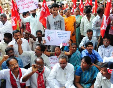 CPI workers raise slogans in support of a separate state of Telangana at the Hyderabad collectorate.