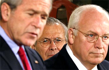 US President George W Bush with Secretary of Defence Donald Rumsfeld and Vice President Dick Cheney