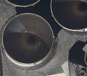 Parts of Atlantis' main engines are visible in this image, which is one of a series of images taken during the back flip or rendezvous pitch maneuver