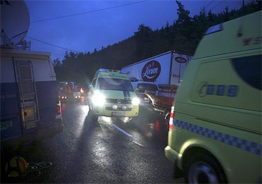 Ambulances are seen on Utoeya island after a shooting took place at a meeting of the ruling party