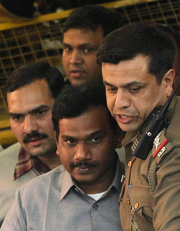A Raja leaves a court in New Delhi