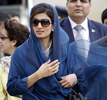 Pakistan's Foreign Minister Hina Rabbani Khar arrives at the airport in New Delhi