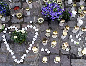 Candles and flowers placed in tribute to the victims