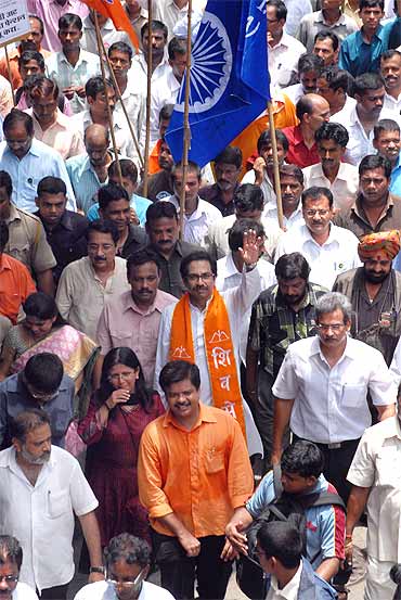 Shiv Sena Executive President Uddhav Thackeray participates in a morcha for the cause of textile mill workers
