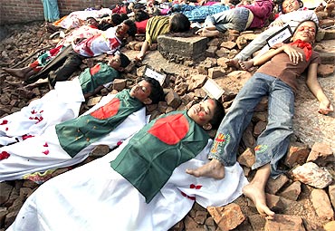 Children enact mock genocide in Dhaka to pay tribute to victims of the 1971 war