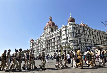 Policemen deployed at the Taj Mahal Hotel
