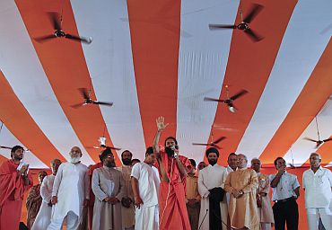 Baba Ramdev addresses his supporters at the Ramlila grounds in New Delhi on Friday