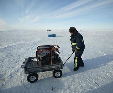 A participant pushes a generator towards a refueling station