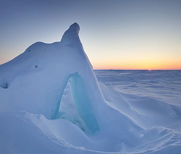 The sun sets over Arctic ice near the 2011 Applied Physics Laboratory Ice Station