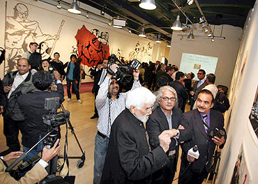 M F Husain in an exhibition of his paintings in US