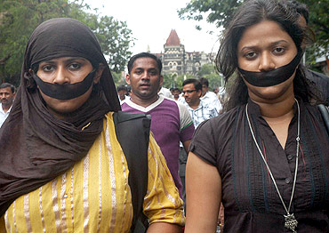 Journalists participate in a rally protesting the death of fellow jounalist Jyotirmoy Dey