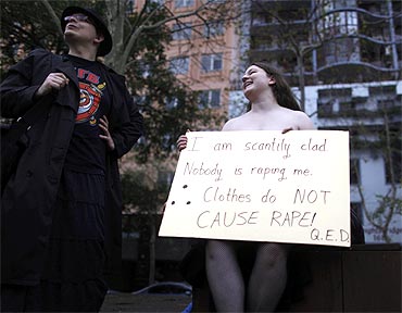 A protester holds a sign during a Slutwalk rally in Sydney