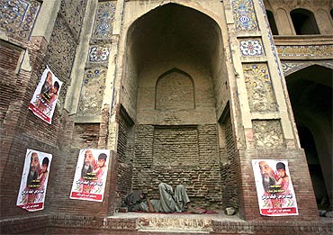 Posters of Osama bin Laden at the Chauburji monument in Lahore