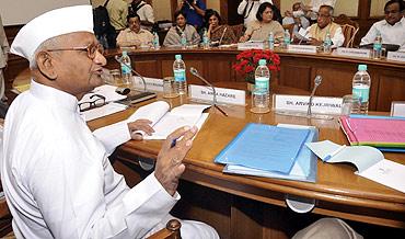 Social activist Anna Hazare speaks during a meeting with government representatives in New Delhi