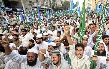 Jamaat-e-Islami supporters protest against US drone strikes