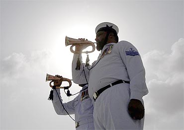 Sailors of Pakistan's Navy play bugles