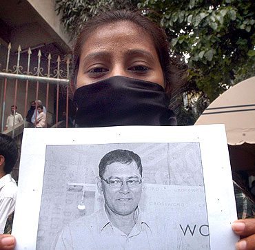 A journalist protests against J Dey's murder in Mumbai