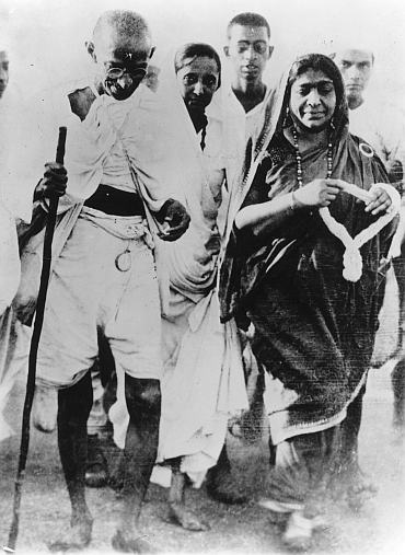 Poet and politician Sarojini Naidu with Mahatma Gandhi during the Salt March