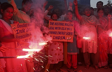 Congress supporters celebrate the approval of US-Indian atomic energy deal