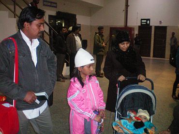 Feroze and Issa with their children on their arrival from Libya in New Delhi