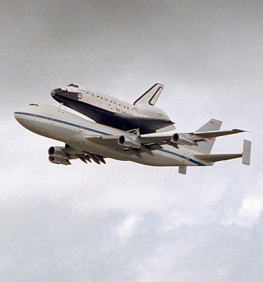 Photo taken on October 9, 1983. NASA's newest space shuttle, Discovery, makes a triumphant fly-by of the Florida Space Coast and the Kennedy Space Centre runway before landing
