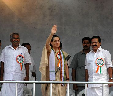 Congress chief Sonia Gandhi with Oomen Chandy , former chief minister and Leader of the Opposition in the state assembly, and Kerala Pradesh Congress Committee (KPCC) president Ramesh Chennithala