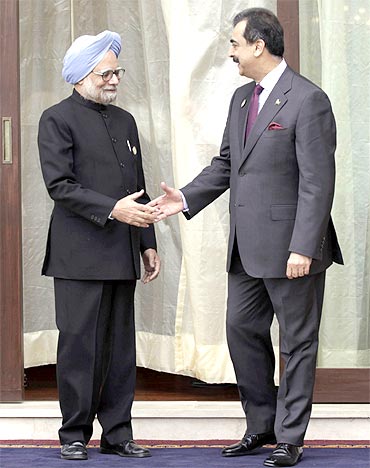 A file photo of Prime Minister Manmohan Singh with Pakistan Prime Minister Yusuf Raza Gilani