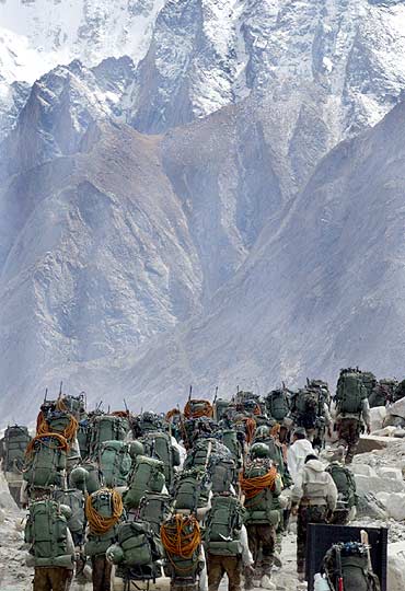 Indian soldiers march during training at Siachen Glacier.