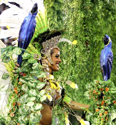 A reveller of the Portela samba school participates in the annual Carnival