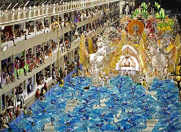 Revellers of the Imperatriz Leopoldinense samba school participate in the annual carnival parade