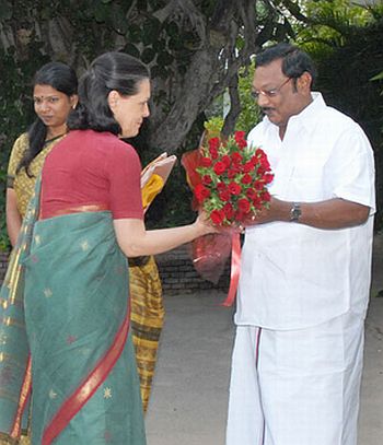 In happier times: Sonia Gandhi greets DMK supremo M Karunanidhi's elder son M K Alagiri