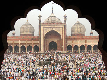 Muslims perform the Eid al-Adha prayers at the Jama Masjid in the old quarters of Delhi