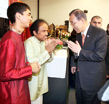 UN Secretary-General Ban Ki-moon greets violin maestro L Subramaniam and son Ambi at the UN headquarters