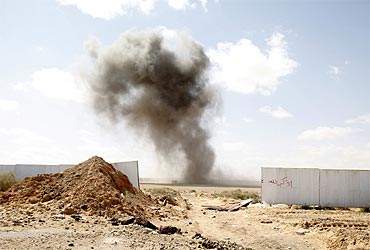 Smoke is seen after an airstrike near the eastern city of Ras Lanuf
