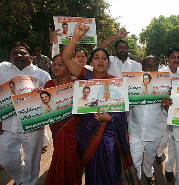 Telangana Congress law makers protest in front of the AP assembly on Wednesday