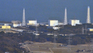 The damaged upper structure of Tokyo Electric Power Co.'s Fukushima Nuclear Plant reactor No 1