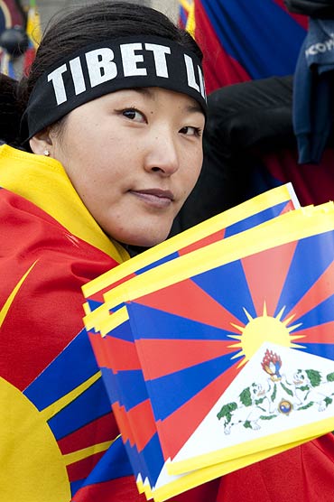 A pro-Tibet activist attends a demonstration in Paris