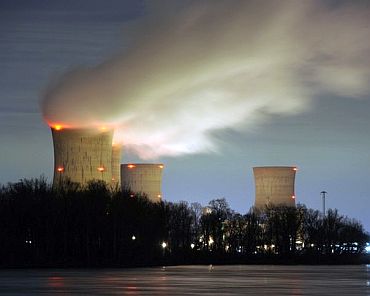 The Three Mile Island nuclear power plant, where the U.S. suffered its most serious nuclear accident in 1979, is seen across the Susquehanna River in Middletown, Pennsylvania in this night view taken March 15