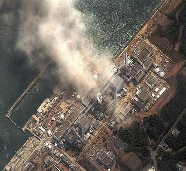 The Number 3 nuclear reactor of the Fukushima Daiichi nuclear plant is seen burning