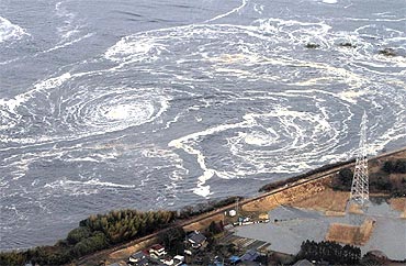 Whirlpools are caused by a tsunami in Fukushima prefecture on March 11