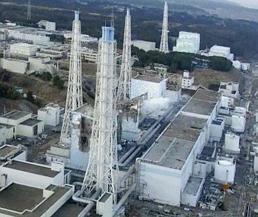 An aerial view shows damage sustained to the reactors at the Fukushima Daiichi nuclear power complex, March 16