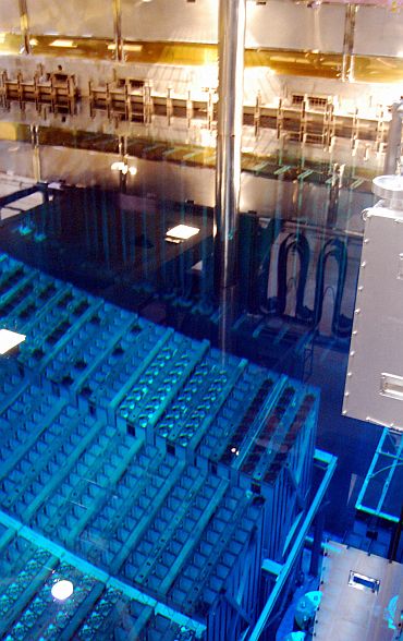 Plutonium-uranium mixed oxide fuel rods are placed in a storage pool at the No 3 reactor of the Fukushima Daiichi nuclear power plant in this picture taken August 21