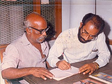 Then Kottayam collector Alphons Kannanthanam teaches an elderly person
