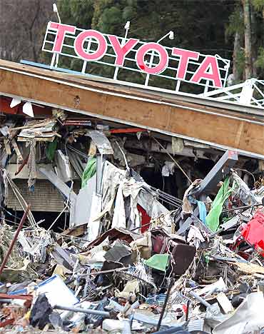 A Toyota dealership is seen at a devastated area after the earthquake and tsunami, in Minamisanriku town, Miyagi prefecture