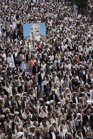Supporters of Yemen's President Ali Abdullah Saleh attend Friday prayers during a counter-rally in Sanaa