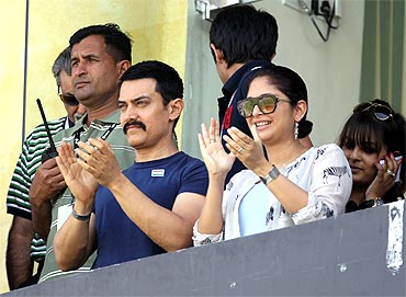 Actor Aamir Khan and his wife Kiran Rao enjoys the atmosphere ahead of the match at Mohali