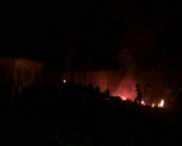 The compound, within which al Qaeda leader Osama bin Laden was killed, is seen in flames after it was attacked in Abbottabad in this still image taken from video footage from a mobile phone